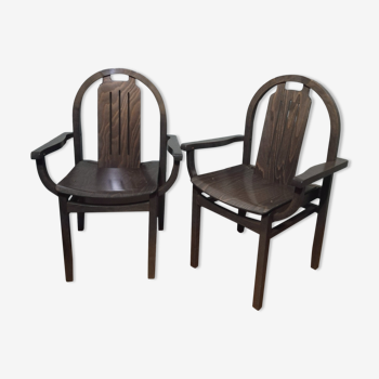 Paire de fauteuils Baumann en hêtre teinté modèle "Argos"