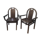 Paire de fauteuils Baumann en hêtre teinté modèle "Argos"