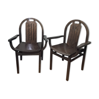 Paire de fauteuils Baumann en hêtre teinté modèle "Argos"