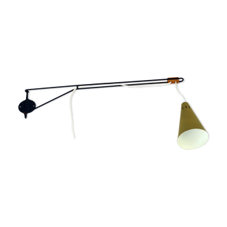 Adjustable "string" type wall light with green original shade.
