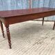 Antique farmhouse table in solid cherry wood with 4 drawers