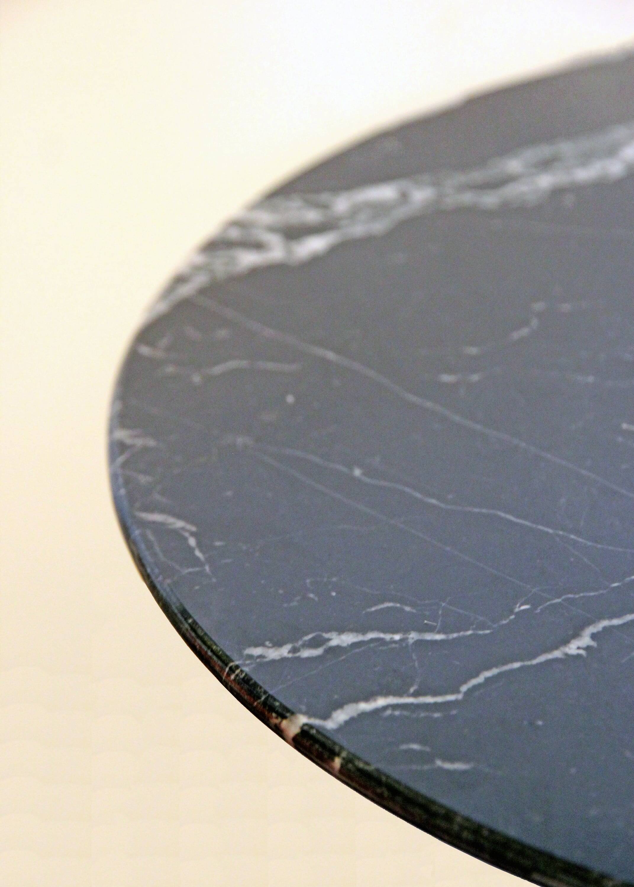 Tulip Knoll pedestal table in black Marquina marble, by Eero Saarinen