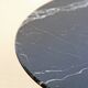 Tulip Knoll pedestal table in black Marquina marble, by Eero Saarinen