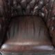 Set of three classic English-style Chesterfield cowhide  club armchairs