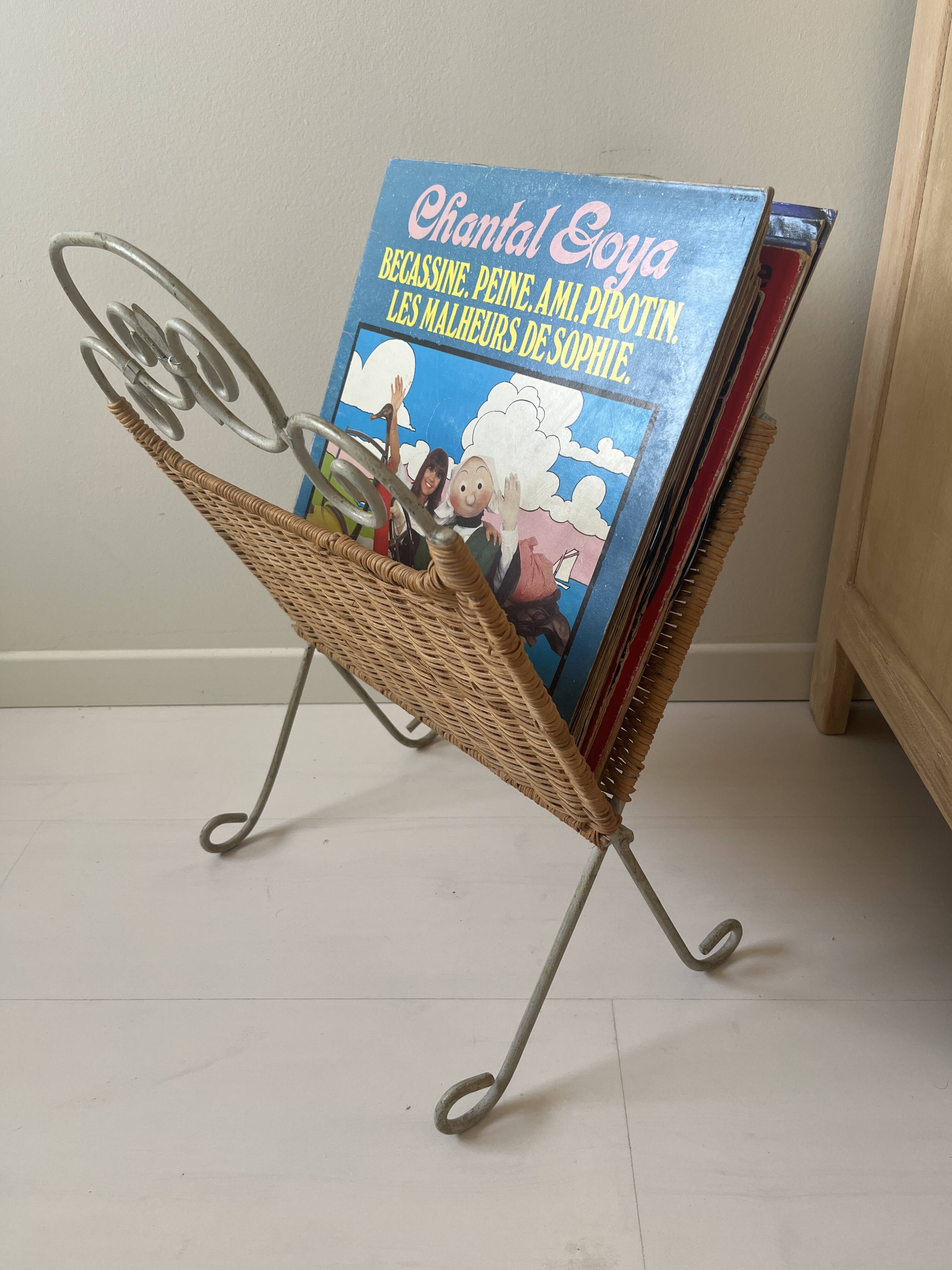 Rattan and shabby wrought iron magazine rack