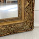 Small old mirror in gilded wood