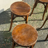 Set of four curved wooden stools stamped Baumann model 92.