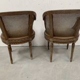 Pair of Louis XVI style basket armchairs in patinated beech, 20th century