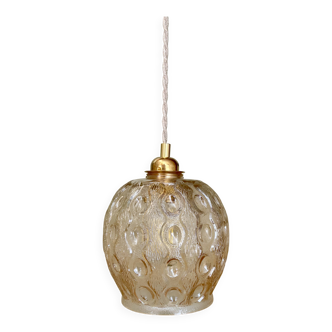 Suspension globe vintage en verre ambré