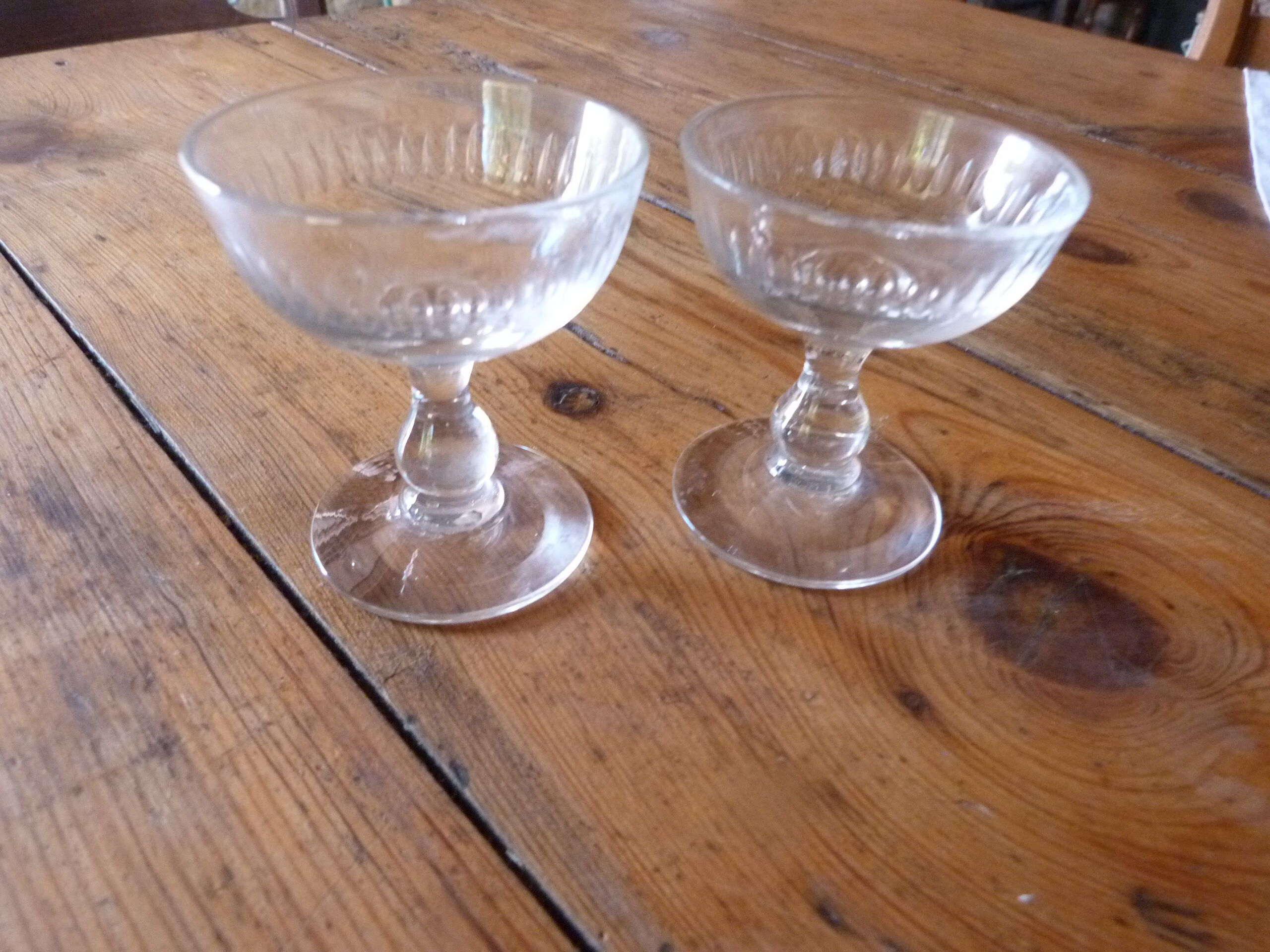 Set of 2 old foot glasses for liqueur