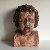 Bust old child in plaster stamped l.j.c.