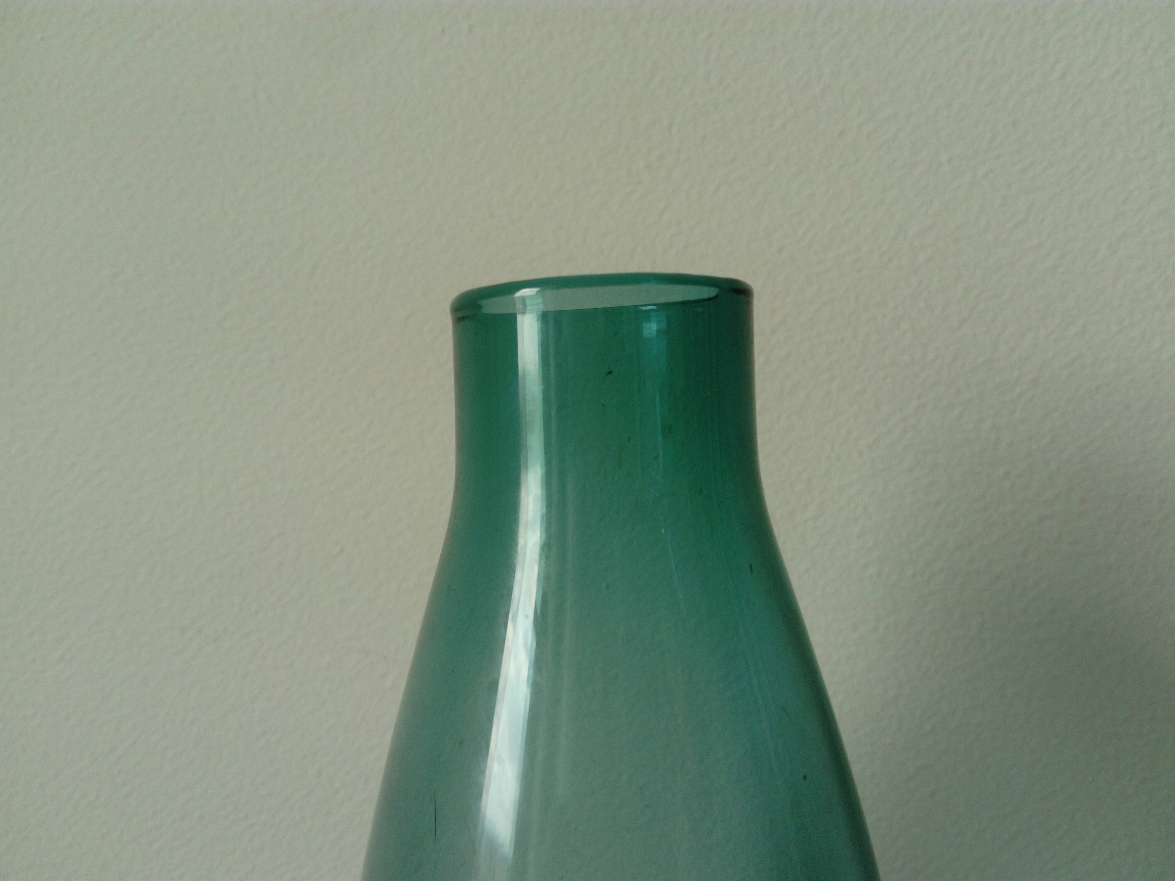 Designer vase in blue-green glass