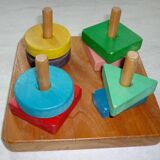 Wooden game stacking geometric shapes