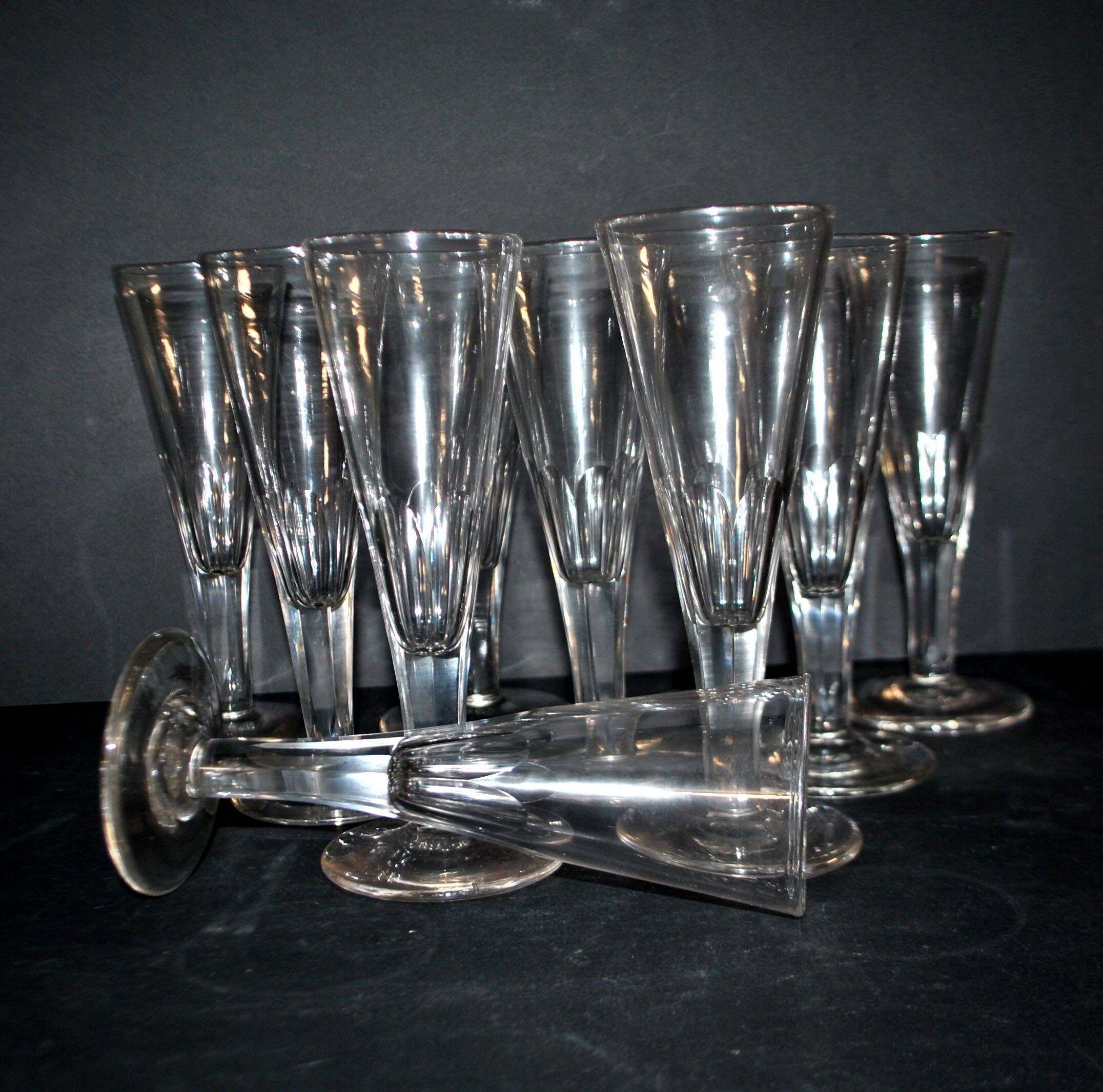 Portieux? Meisenthal? Set of 10 cut glass champagne flutes with flat sides from 1900.