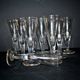 Portieux? Meisenthal? Set of 10 cut glass champagne flutes with flat sides from 1900.