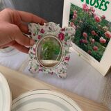 Miroir ancien en porcelaine motif roses
