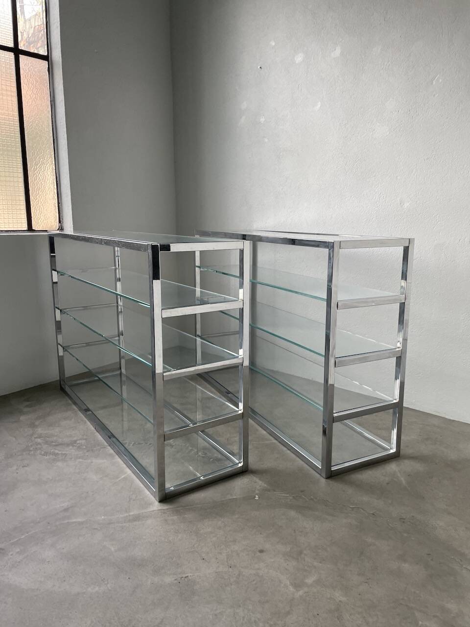 Pair of chrome and glass shelves from the 70s