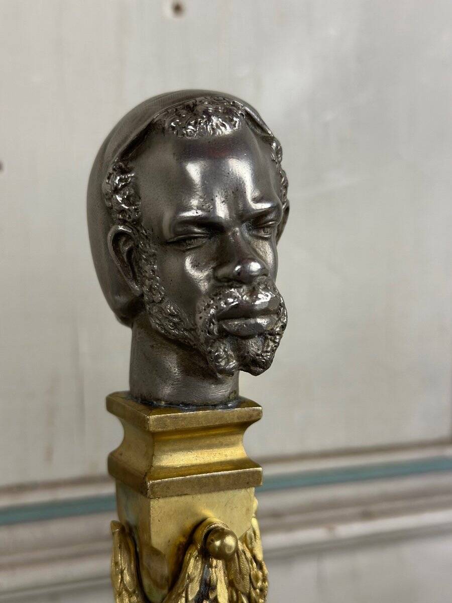 Pair of Abyssinian busts in nickel on gilded bronze and marble bases, 19th century.