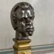 Pair of Abyssinian busts in nickel on gilded bronze and marble bases, 19th century.