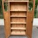 Parisian bonnetière cabinet, stripped display in solid oak from the 1930s.