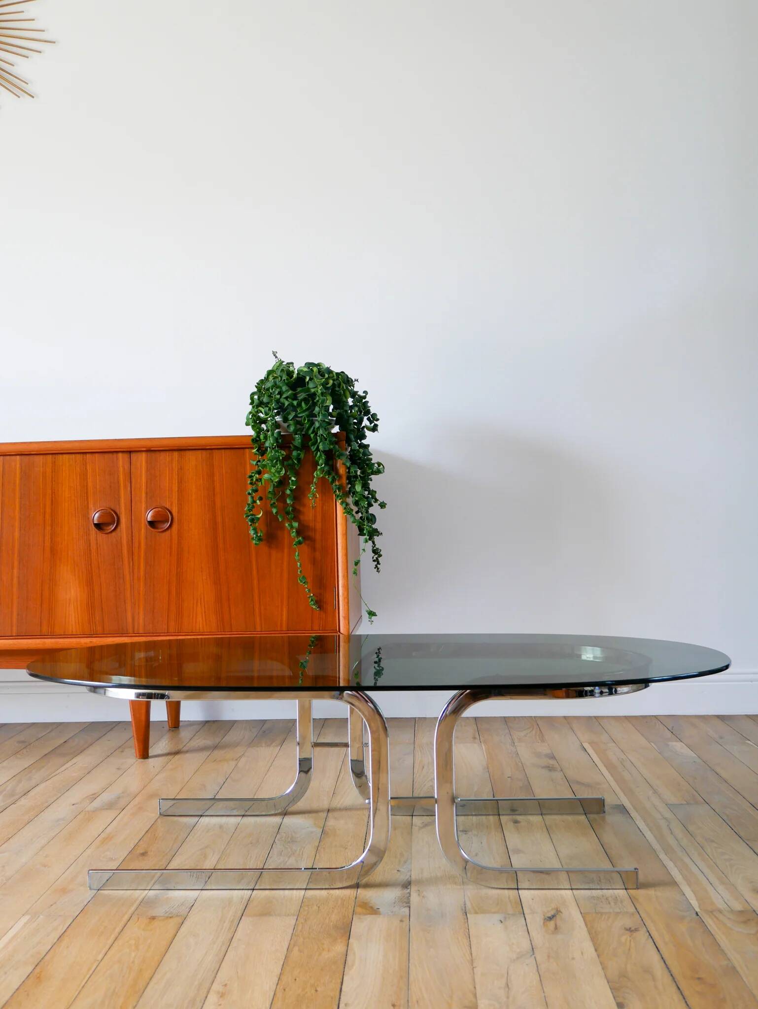Oval coffee table in smoked glass and chrome, original double S design base, 1970.