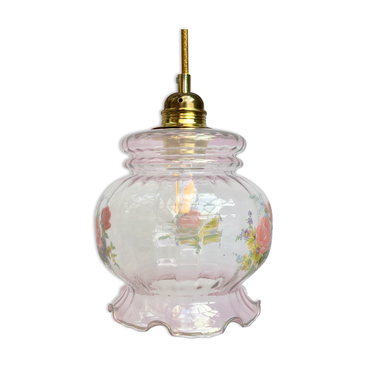 Vintage pink glass hand lamp with flower motifs