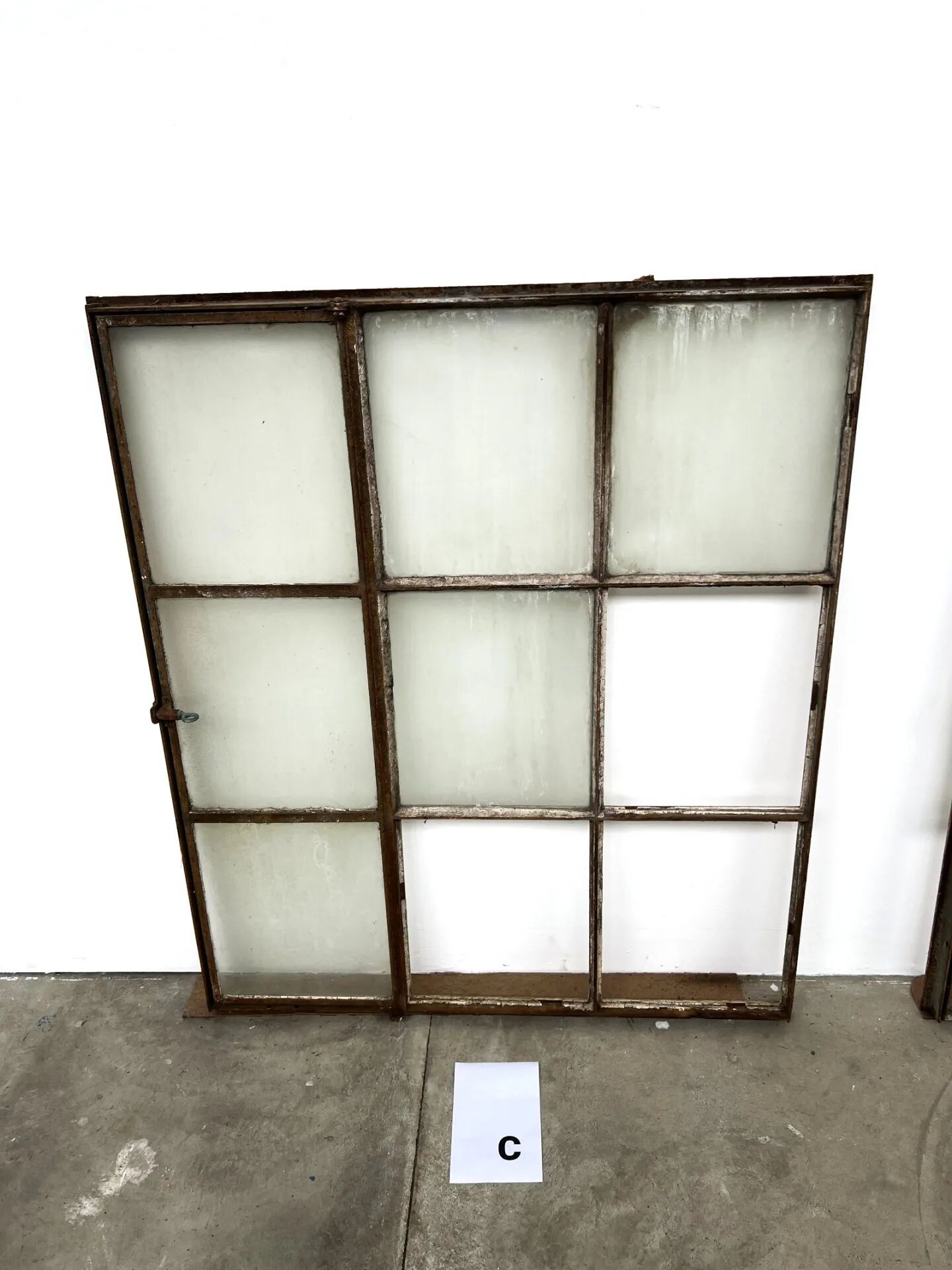 Old steel workshop skylight with opening.