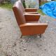 Paire de fauteuils vintage en skaï marron