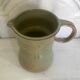 Jug and its vintage stoneware glasses