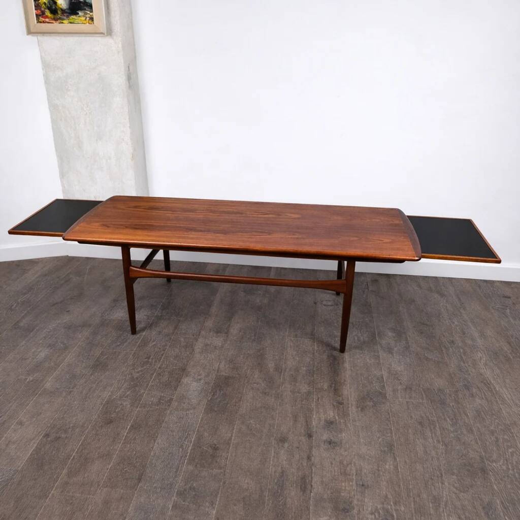 Teak coffee table with retractable tops attributed to Robert Christensen for Arrebo Mobler, Denmark, 1960.