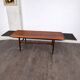 Teak coffee table with retractable tops attributed to Robert Christensen for Arrebo Mobler, Denmark, 1960.