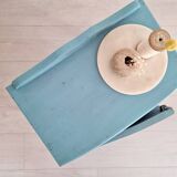 Old blue wood bedside table