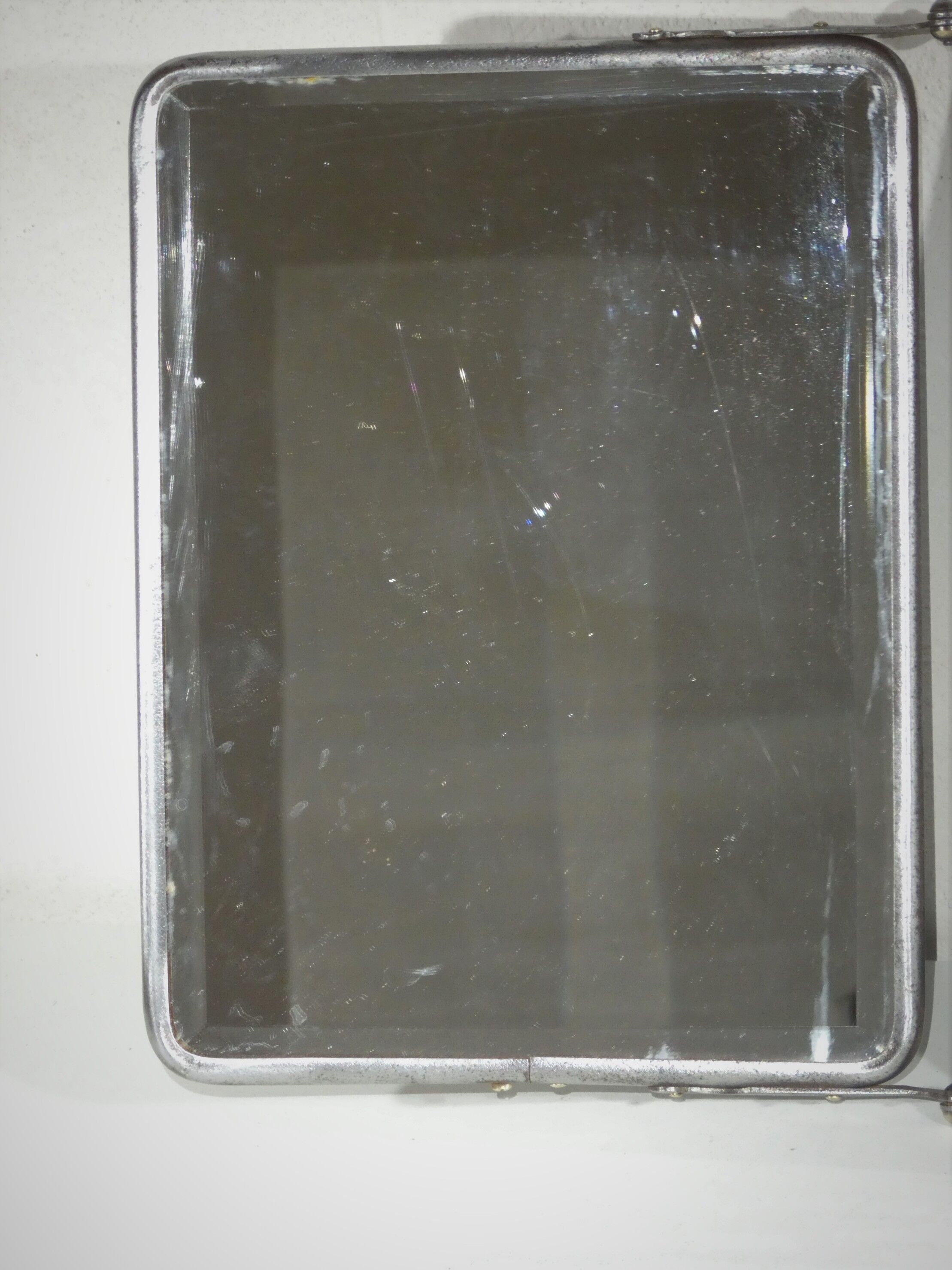 Tryptic barber's mirror