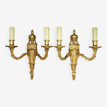 Pair of large sconces with ram's heads in Louis XVI style - bronze