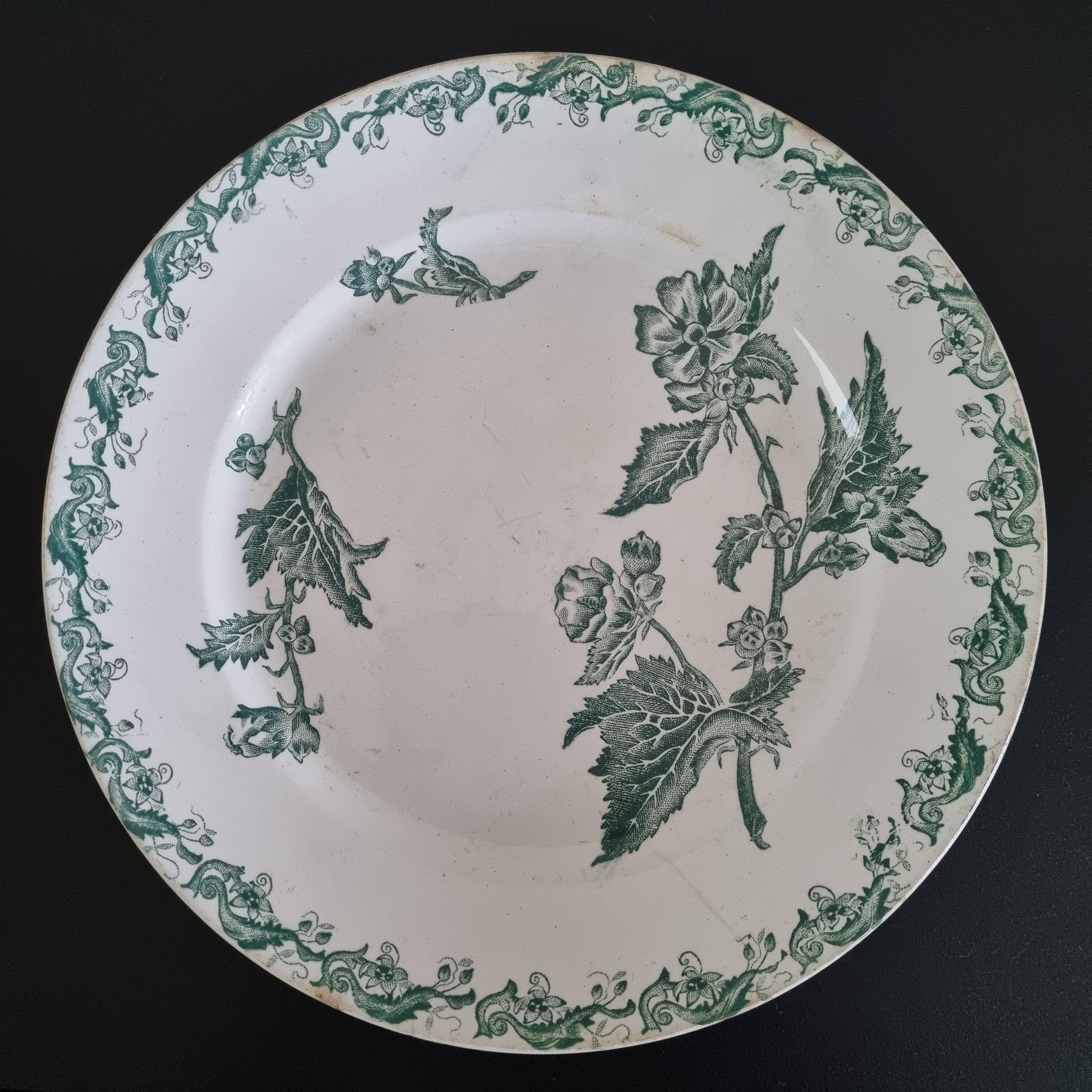 Antique plate in Saint Amand faience