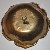 Empty-pocket flower in solid brass