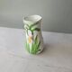 Vase in slipware with Arum flowers