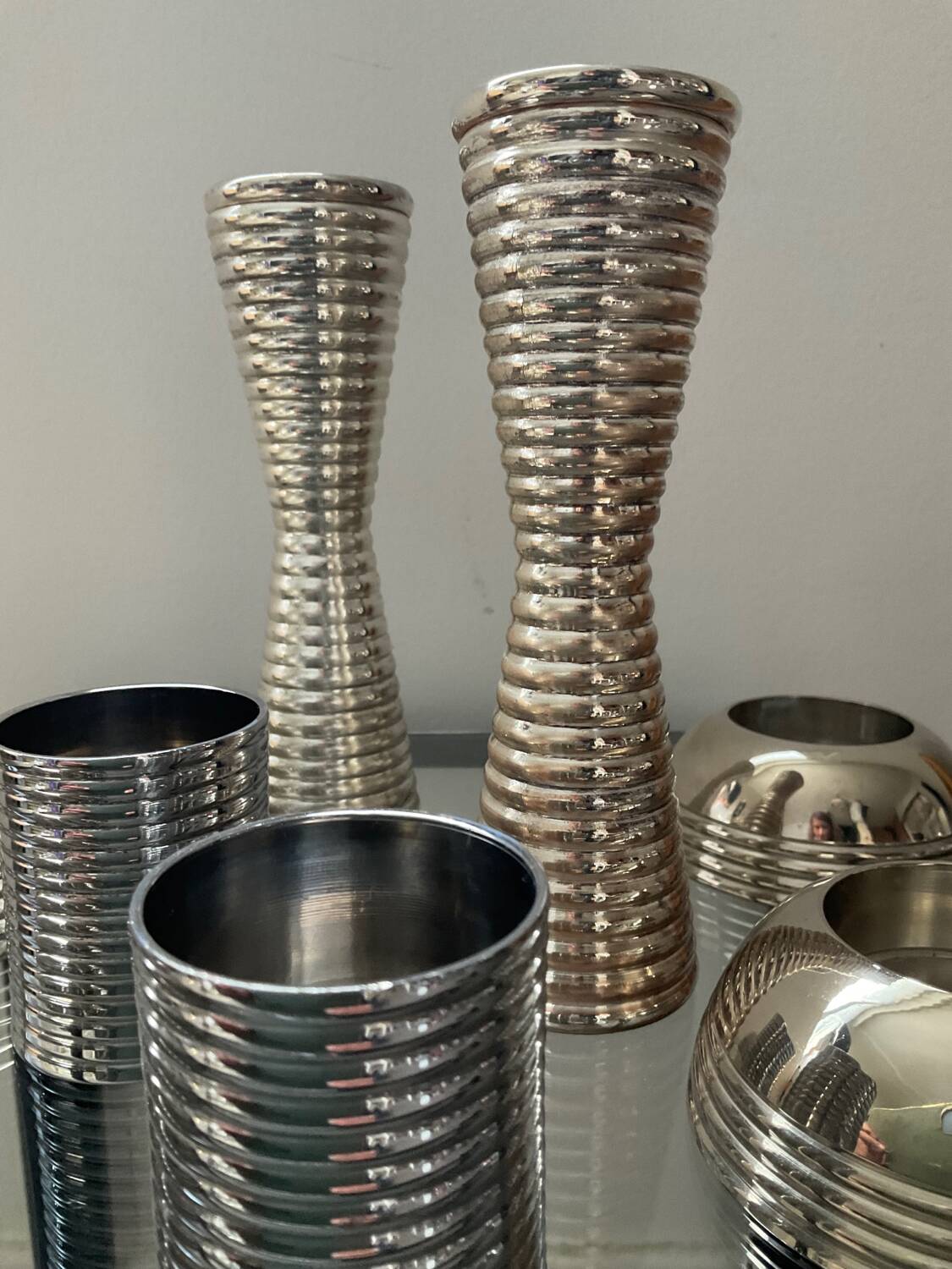 Series of 8 vintage candlesticks in silver metal