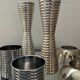 Series of 8 vintage candlesticks in silver metal