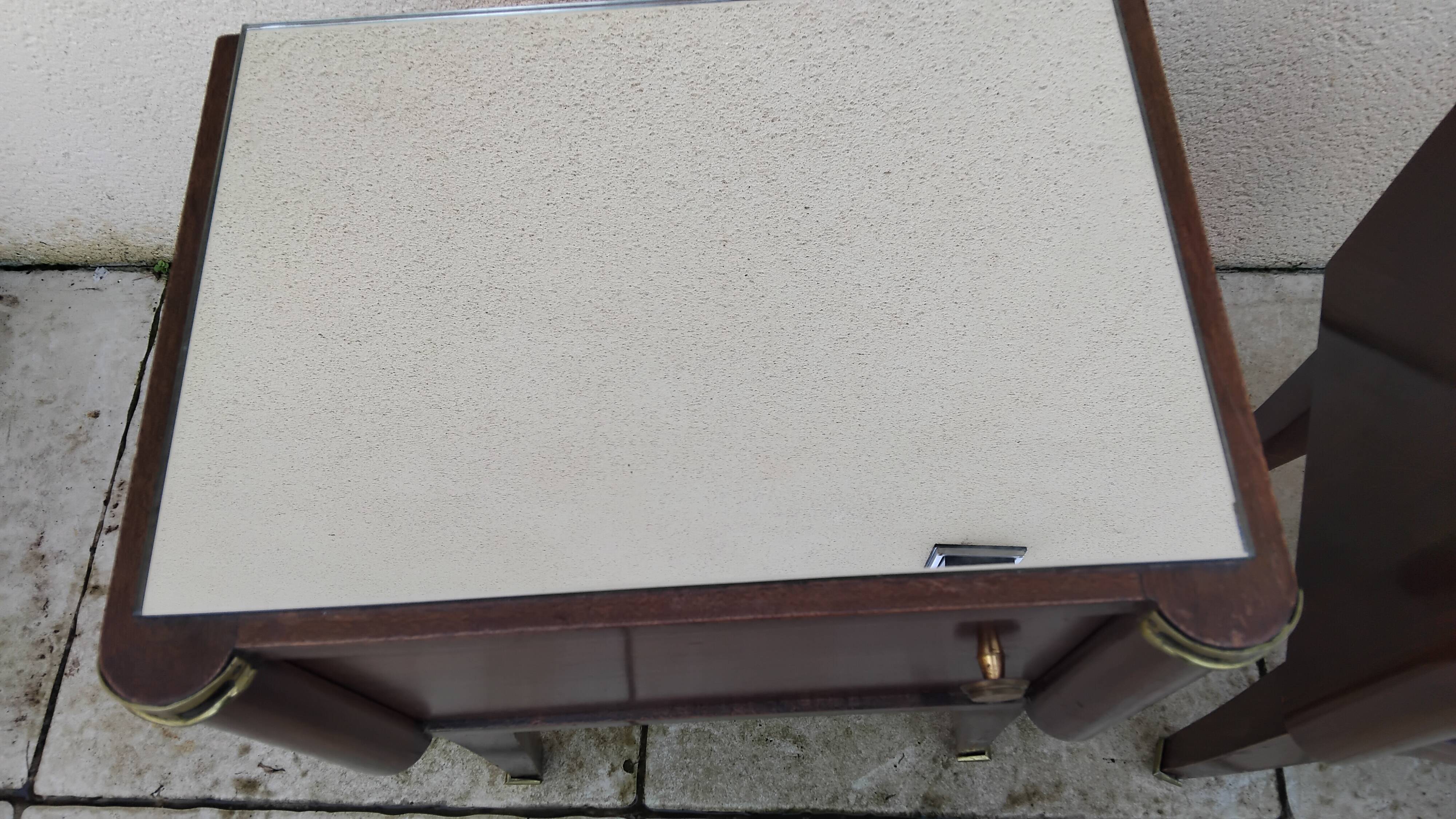 Vintage bedside table with a mirrored top, Art Deco style.