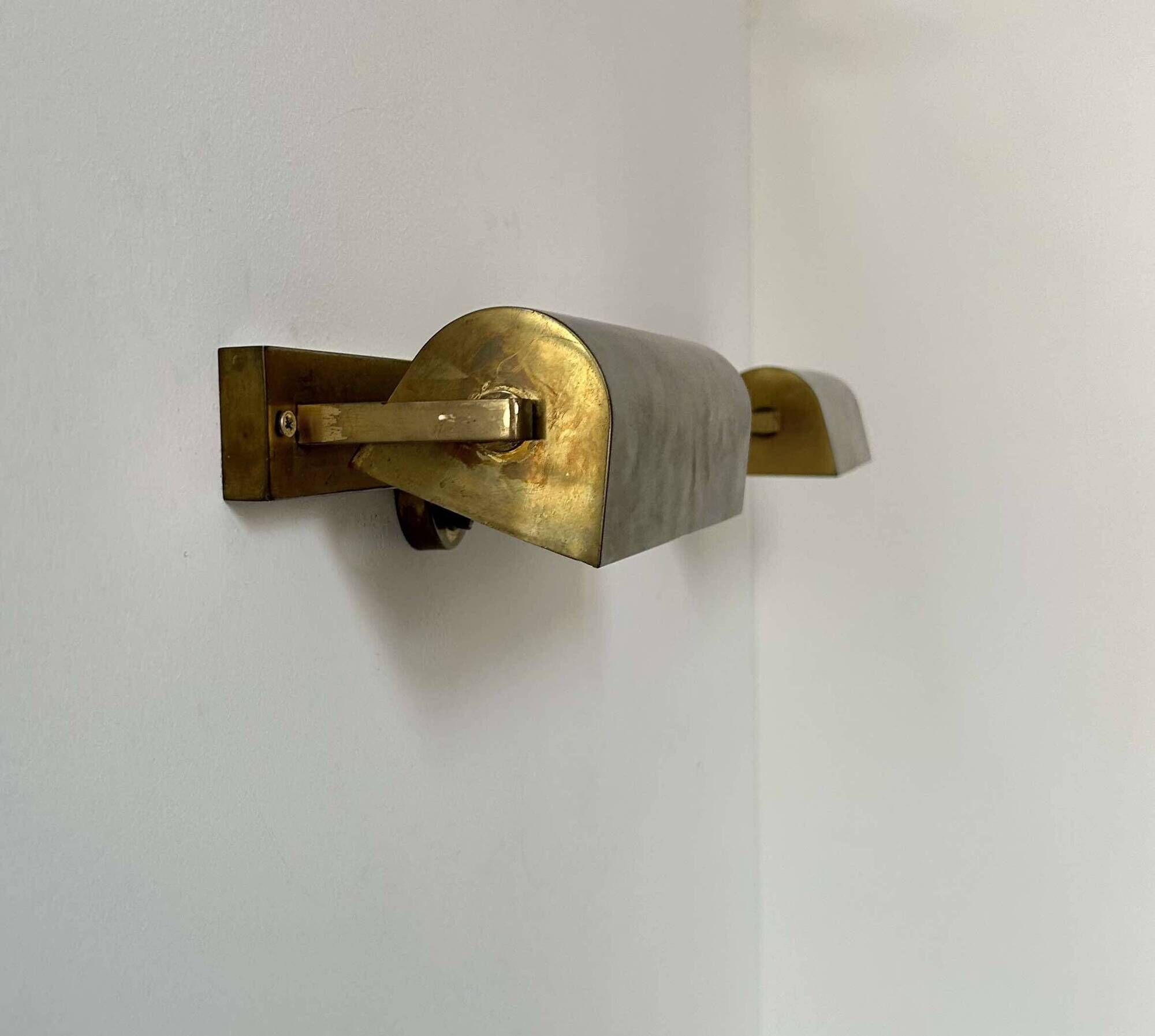Pair of vintage modernist wall lights, adjustable in brass, France 1940