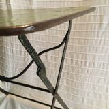 Folding riveted iron table