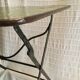 Folding riveted iron table