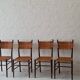 Four teak dining chairs with patinated cane after Gio Ponti, Italy 1960s