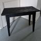 Table basse en bois brûlé