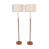 Pair of tan leather floor lamps