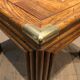 Pair of wooden and brass sofa ends
