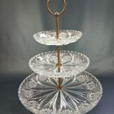 Three-storey display in chiseled glass and brass