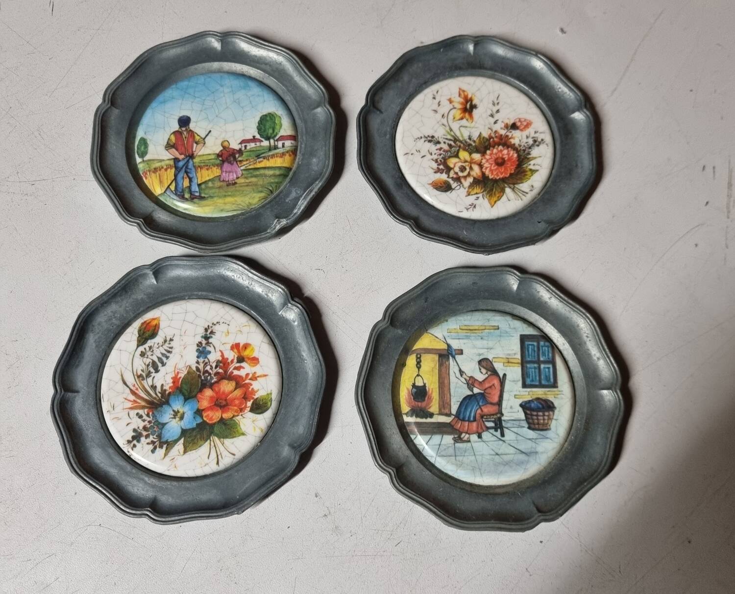 Set of 4 pewter and porcelain coasters from the 1960s/70s (see above for vintage).