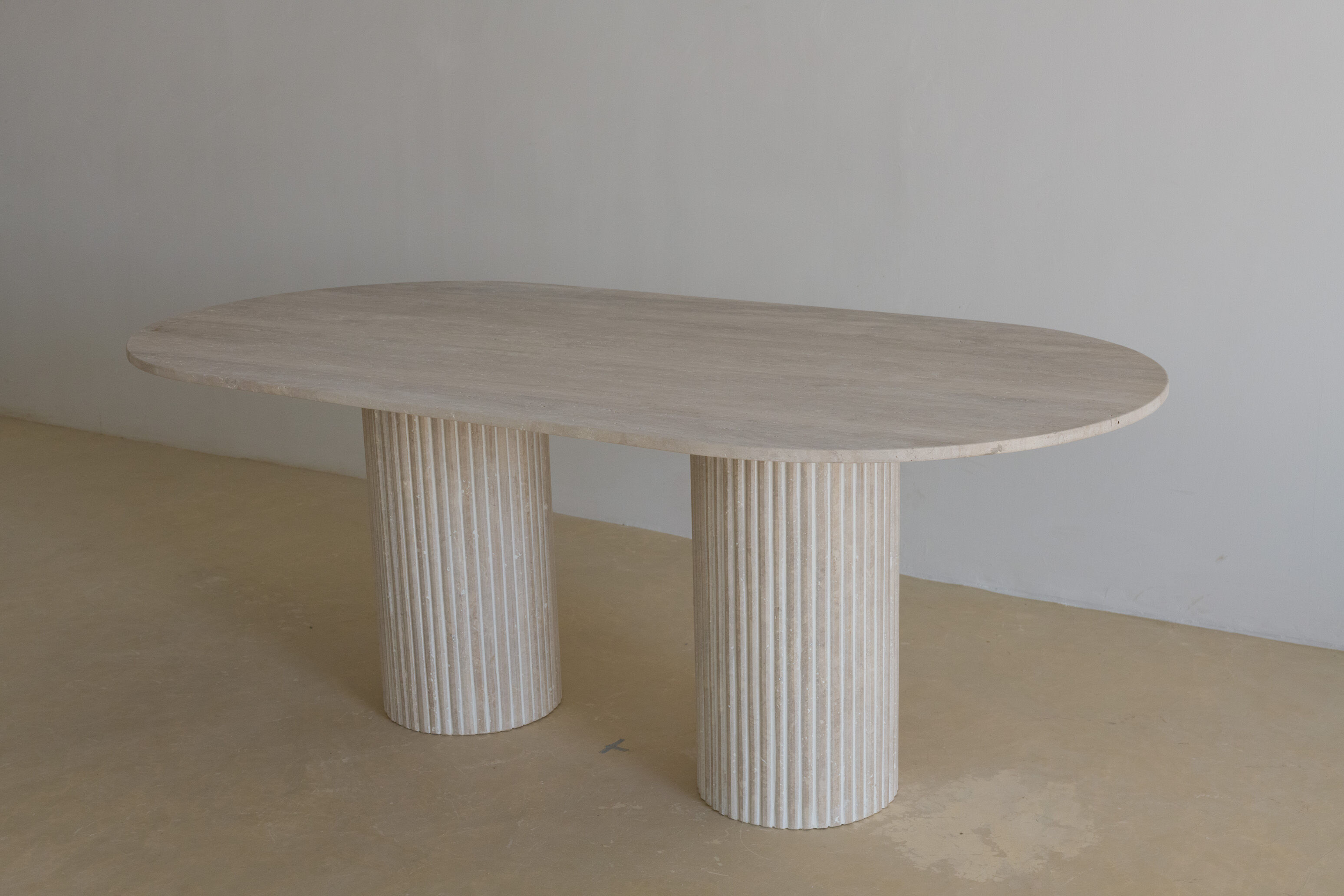 Olya oblong dining table 150x90 in natural travertine